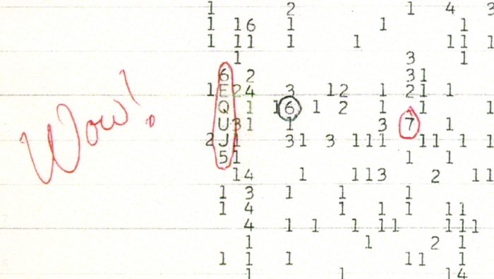 Image of hand-written note detecting a radio signal that spells wow