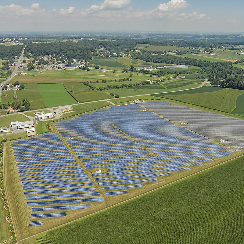 arial image of a field full of solar panels