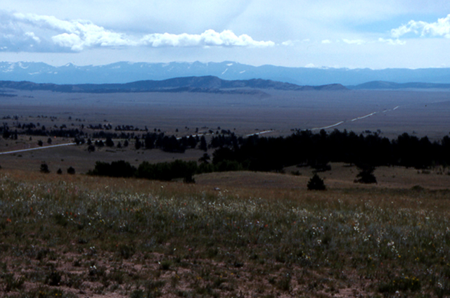 South Park viewed from Wilderson Pass.  Fields in front of the mountain range.