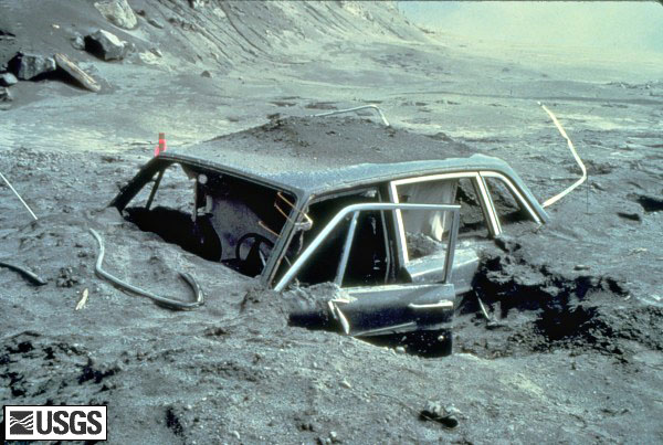 A car buried in lava approximately 10 miles from Mount St. Helens.