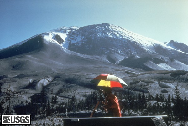 Mt. St. Helens on April 27, 1980 shows a bulge developing on the N. side.