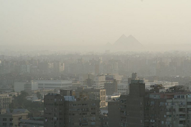 smog over Cairo, Egypt with pyramids in background
