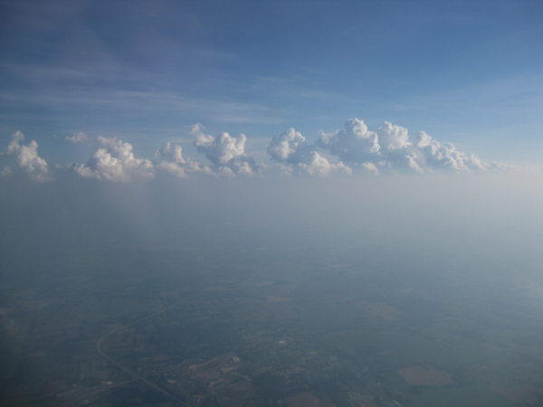 cumulus riding on top of a hot hazy summer atmospheric boundary layer as seen from above