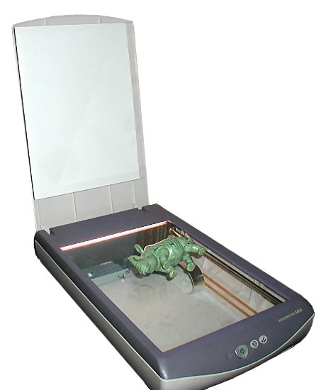 Photo of a scanner with a toy rhinoceros on it