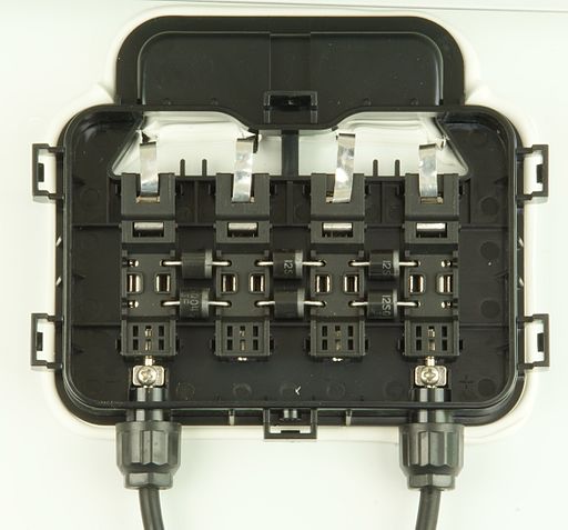 PV module Junction Box with wires connected from the semiconductor to the outer circuit