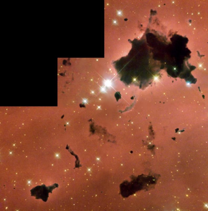Hubble Space Telescope image of Bok Globules in IC 2944 in color, described in text