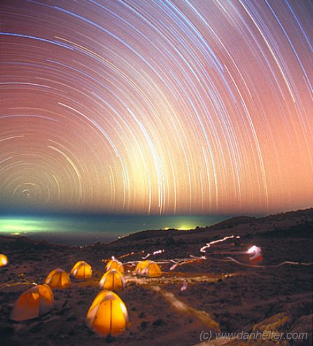 Time-lapse photo of apparent motion of stars across the night sky as seen from Mt. Kilimanjaro