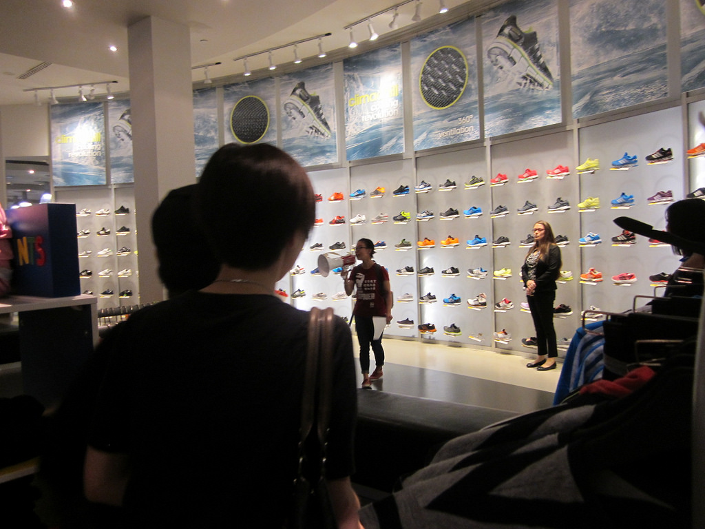Protester with bullhorn in Nike store