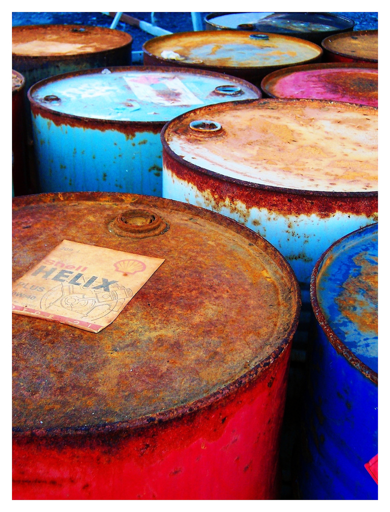 image of colorful but rusty steel drums 