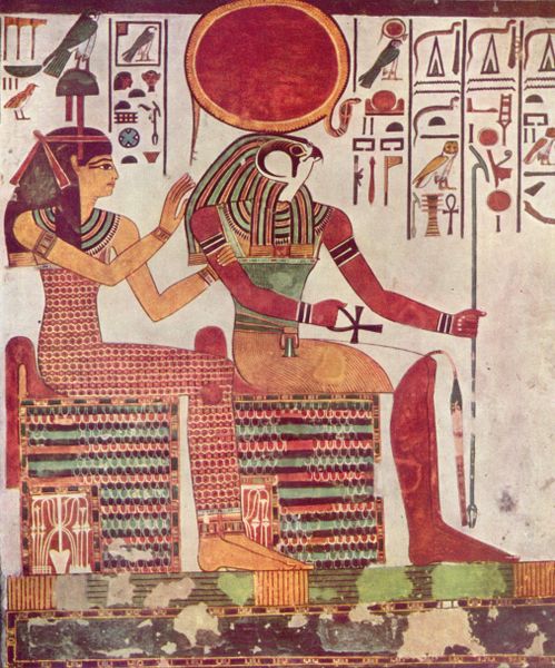 Egyptian art work of girl and sun god sitting next to each other  