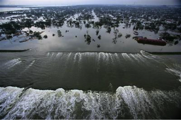 Water is spilling over the Inner Harbor Navigational Channel and on the shore only tops of trees are seen above water.