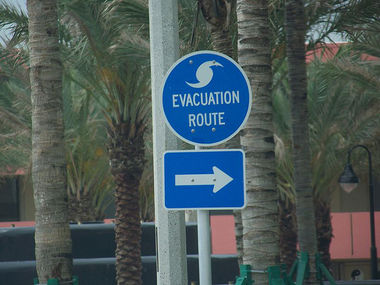 Evacuation Route sign with arrow