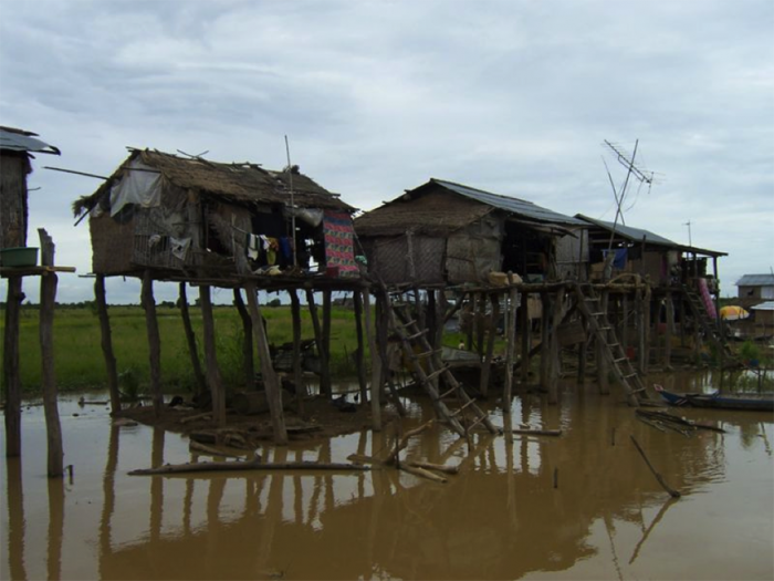 Houses on stilts, image described in the caption