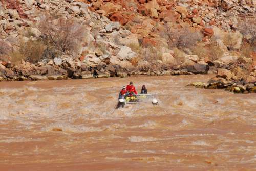 Photo of people in a raft on the colorado river