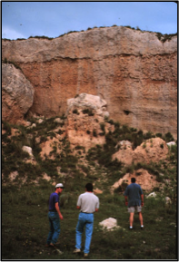 People looking at rock face in Texas