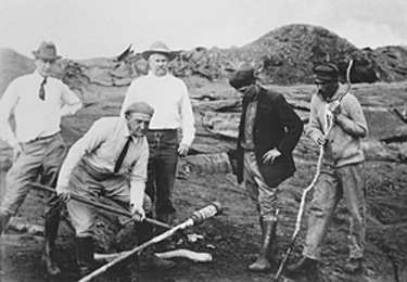 Thomas Jaggar (second from left) prepares to measure the temperature of the Halema`uma`u lava lake in 1917. 