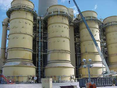 scrubbers at power plant: image shows 4 large round towers in a row