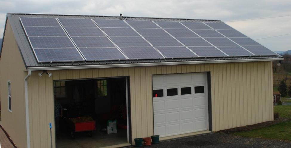 garage with solar array installed on roof