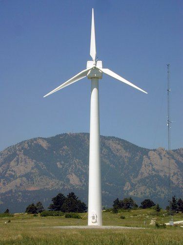 100-kw wind turbine. medium turbine in field