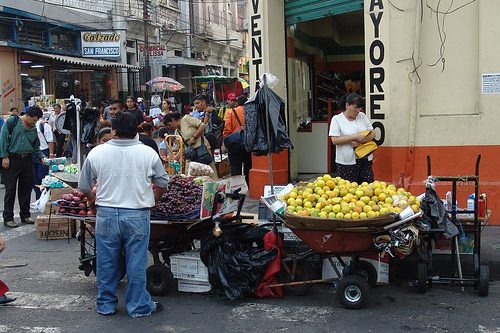 A street vendor selling fruits.