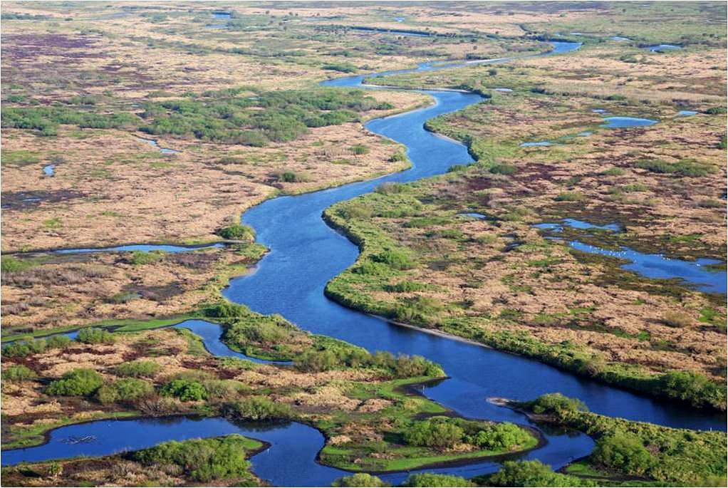 River flowing through pieces of land