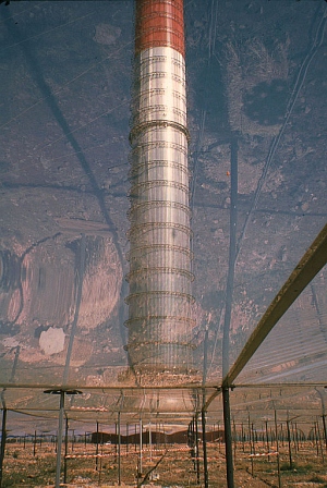 large red and white cylinder building see caption for more detail