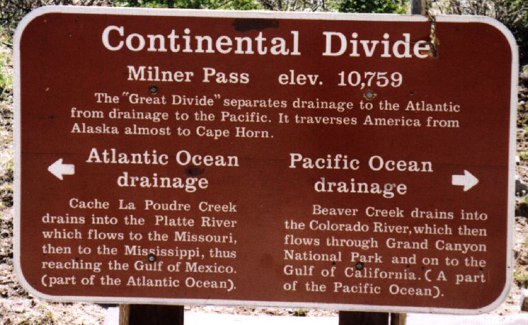 Sign indicating the continental divide in Rocky Mountain National Park, CO.