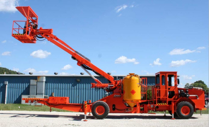 Blasting truck with large boom and basket attached. See text above for more. 