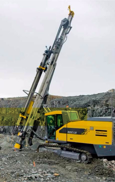Track-mounted down-the-hole drill. See text above for more. 