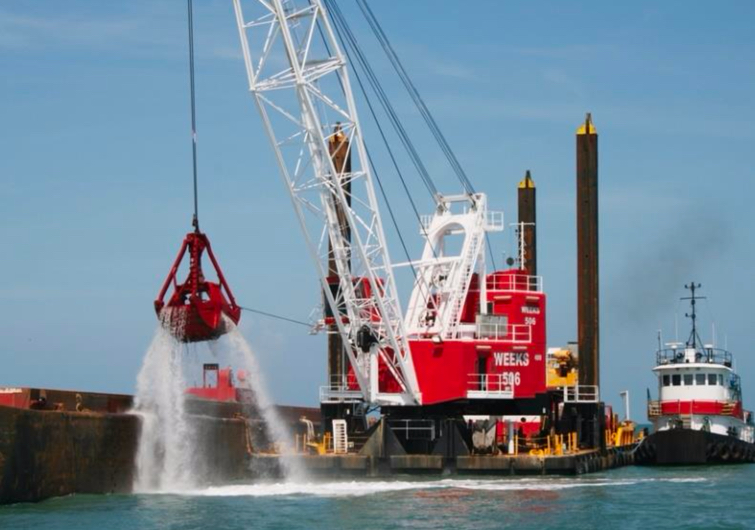 photo of a clamshell dredge