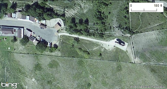 Aerial view of landscape and a buffalo monument in Jamestown, North Dakota. More in surrounding text. 