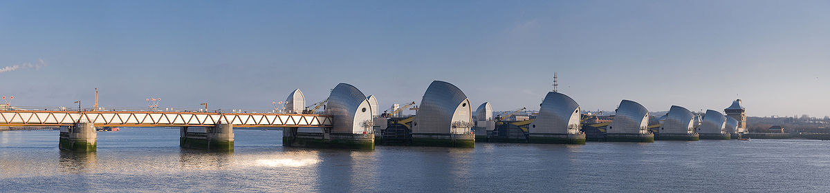 Thames Barrier on the River Thames with silver dome-shaped gates.