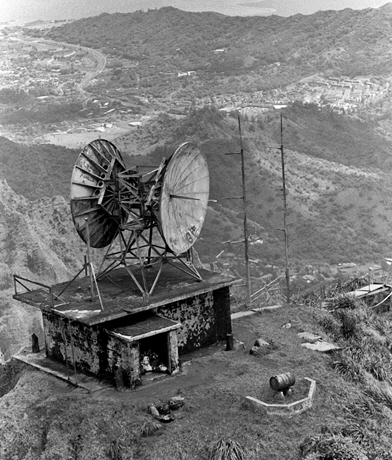 An Omega Station: small building with two satellites facing directly away from each other