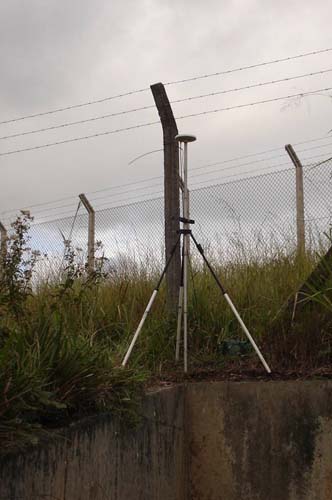 Illustration of a receiver near a chain link fence