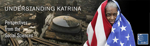 Title: Understanding Katrina, perspectives from the social sciences. Background = devastation from Katrina, foreground = older black woman wrapped in flag