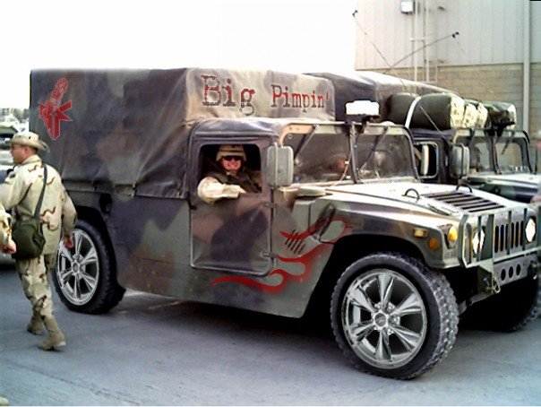 military personnel in vehicle