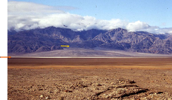 Mountains with salt flat at the bottom.