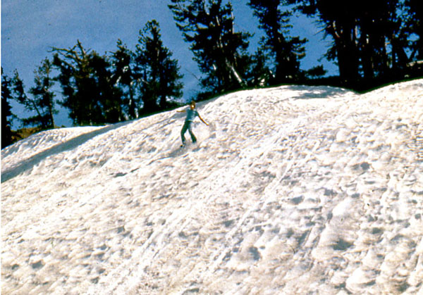 A man skiing down Crater Lake