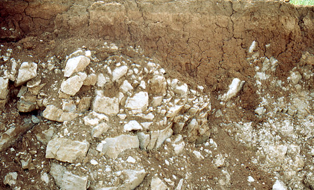 Excavation area in State College, PA shows soil over limestone and formation of a small sinkhole