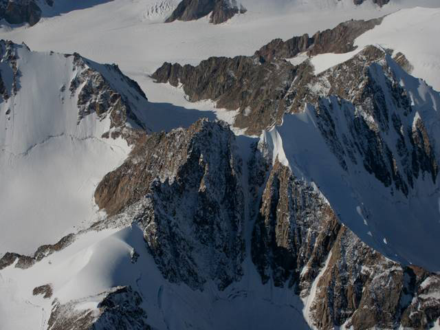 Horn, Stauning Alps, NE Greenland National Park. Several cirques intersect and leave a towering peak.