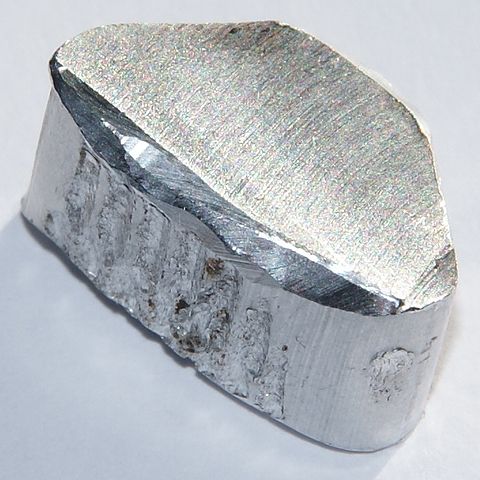 Aluminum, silver rock chunk.