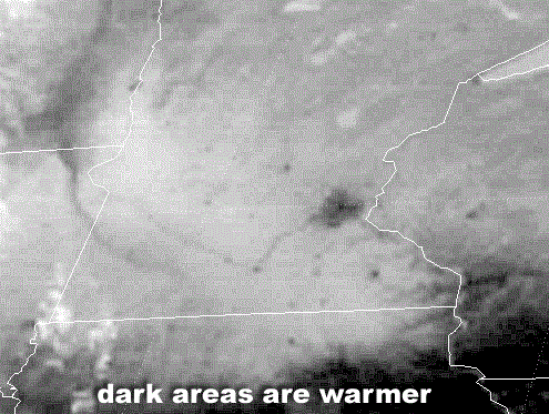 Infrared satellite image of southern Minnesota and surrounding states, showing several dark (warm) splotches.