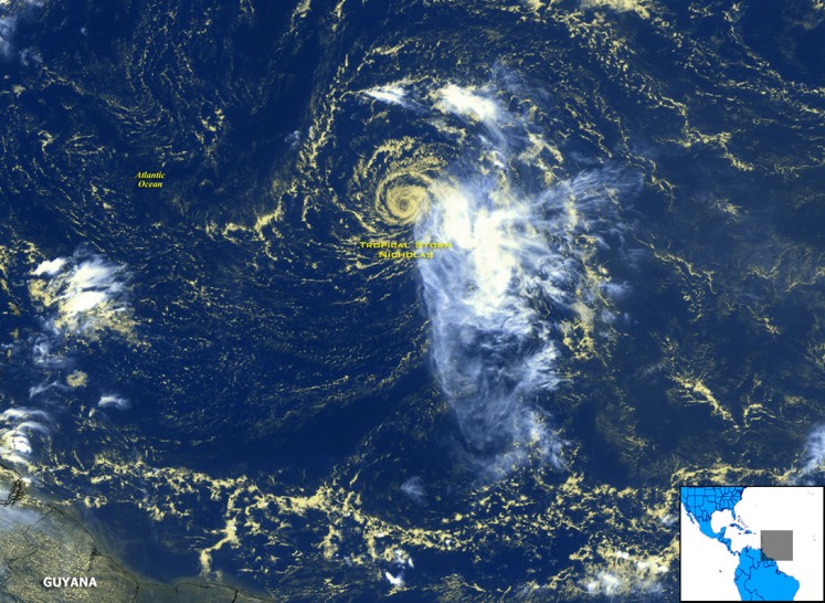 Multi-channel satellite image: Nicolas (2003) struggling with strong vertical wind shear.