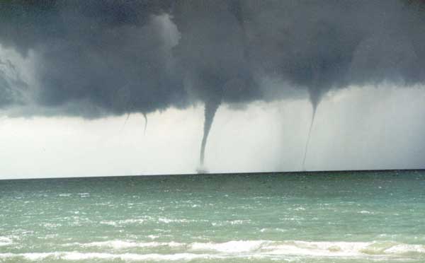Photograph of a family of four waterspouts on Lake Huron on September 9, 1999.