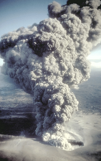 phreatomagmatic eruption, dark grey clouds. See caption